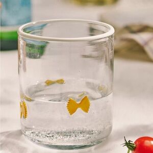 Anthropologie Icon Juice Glass with Pasta Bowtie Design